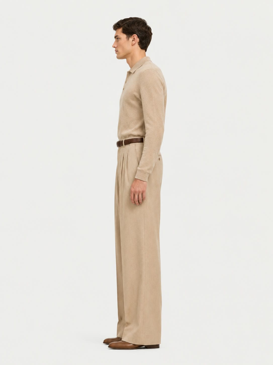 The Travel Polo in ecru merino, studio view