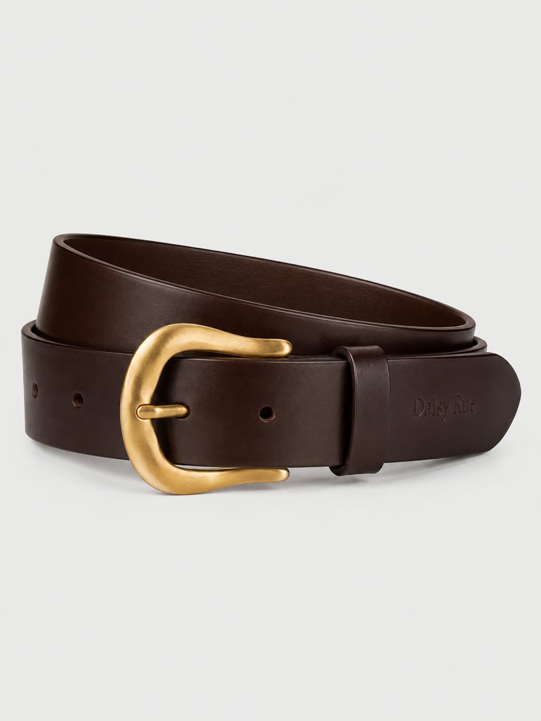 The Leather Belt in espresso bridle leather with a brass buckle