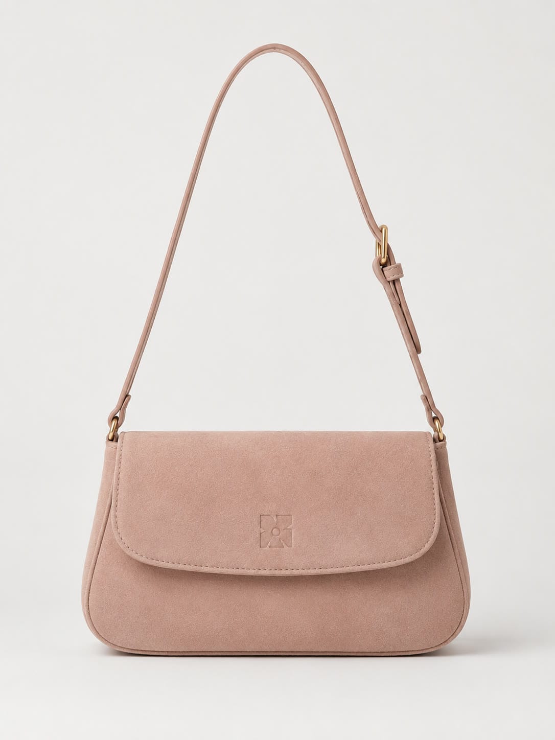 The Shoulder Bag in blush leather with a fold-over flap