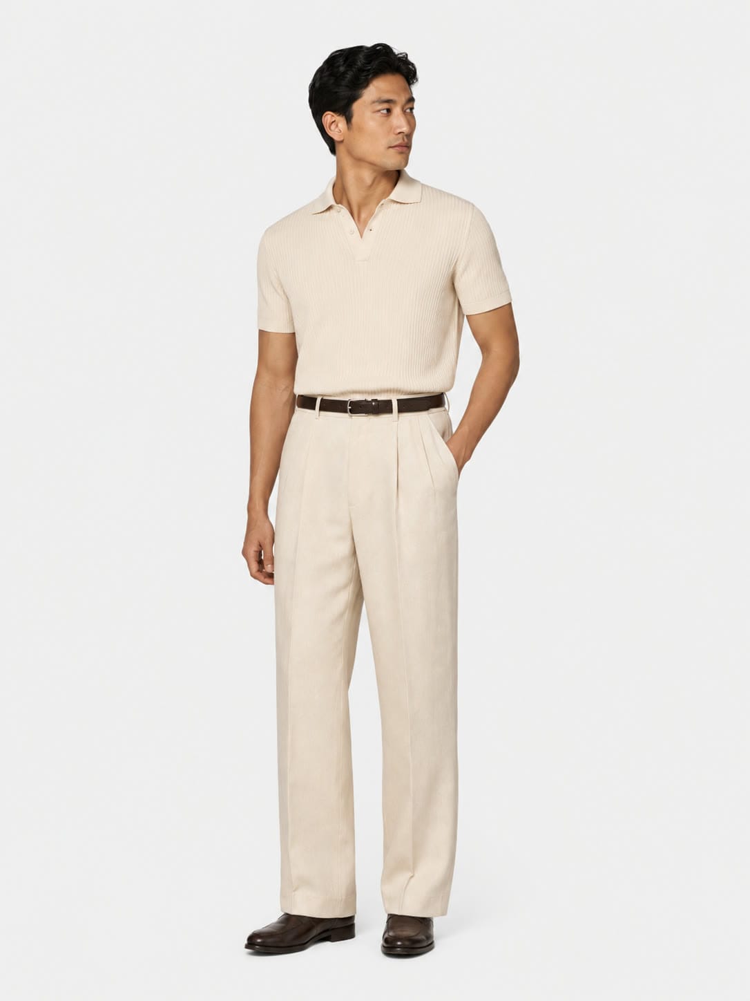 The Pleated Trouser in ecru, studio view