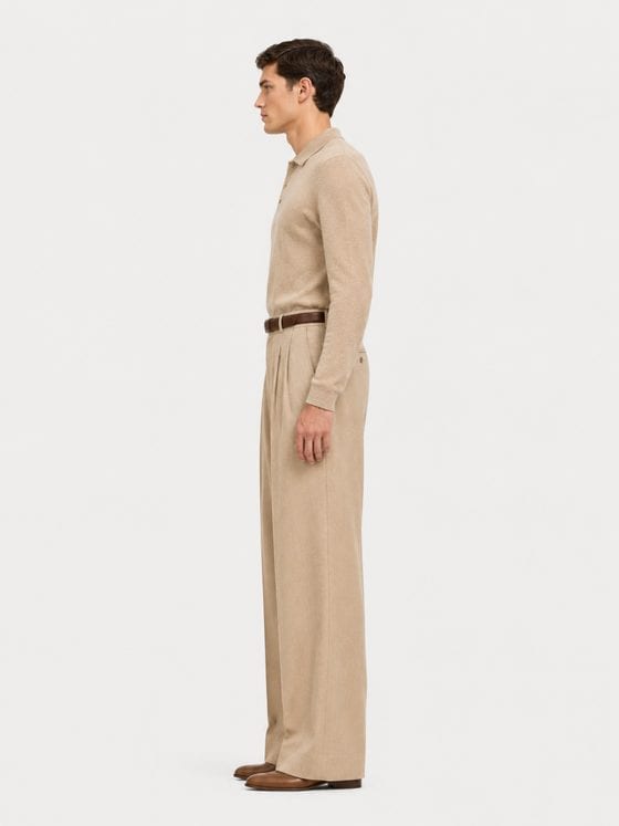 Look 07 — the long-sleeve travel polo with pleated trousers